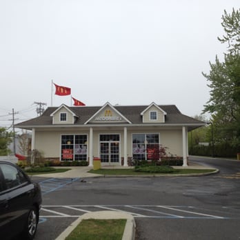 McDonald's - a black car parked in front of a mcdonald's - Fast Food Near Me - Lynbrook, New York