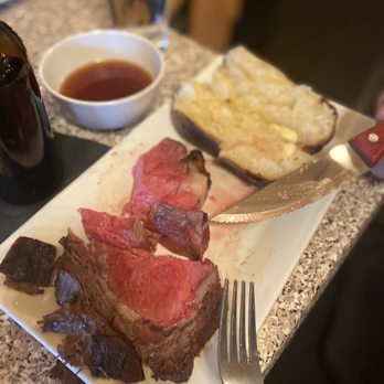 Blinkers Tavern - a plate of steak and bread - Steakhouses Near Me - Covington, Kentucky
