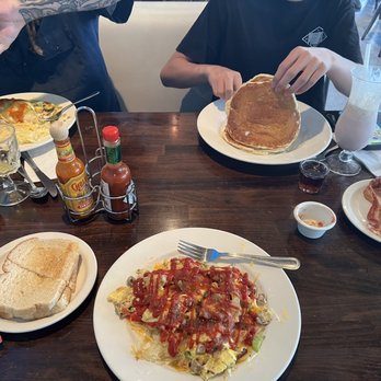Good Stuff Restaurant - Skillet scrambled sour dough toast, pancakes and bacon & breakfast burrito. - New American Near Me - El Segundo, California Good Stuff Restaurant - Skillet scrambled sour dough toast, pancakes and bacon & breakfast burrito. - New American Near Me - El Segundo, California