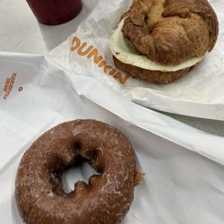 Dunkin' - Sausage, egg, and no cheese, croissant sandwich, and pumpkin doughnut