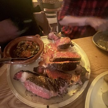 Bacanora - Perfectly cooked, ridiculously sized tomahawk steak. It came with a giant bone, but someone was gnawing on it... - Mexican Near Me - Phoenix, Arizona