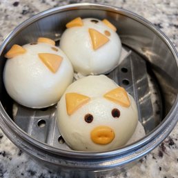 Pork dumpling with no pork in it at all. Should be called sweet egg custard dumpling shaped like a pig.