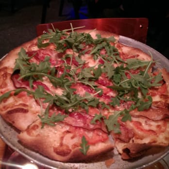 Greenbush Bar - Their Specialty Pizza. Arugula, bacon, tomato, Gorgonzola, thin and crispy! - Italian Near Me - Madison, Wisconsin