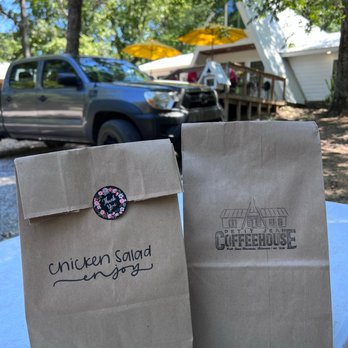 Petit Jean Coffeehouse - two bags of coffee on a table - Coffee & Tea Near Me - Morrilton, Arkansas Petit Jean Coffeehouse - two bags of coffee on a table - Coffee & Tea Near Me - Morrilton, Arkansas