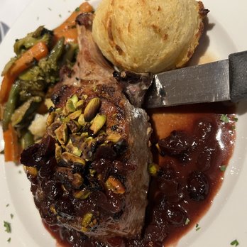 Casa di Fratelli - Pistachio and cranberry pork chop - Italian Near Me - Westbury, New York Casa di Fratelli - Pistachio and cranberry pork chop - Italian Near Me - Westbury, New York