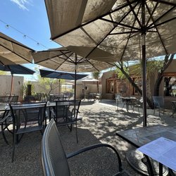 Xetava - Shaded outdoor seating, the patio vibe is real.