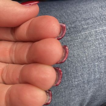 Ann Nails & Spa - Did not trim natural nails underneath fake. Also did not remove glue. - Nail Salons Near Me - Crown Point, Indiana