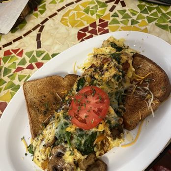 Cafe Veneto - Vegetable omelet with mushrooms, spinach, peppers, and cheese. - Breakfast & Brunch Near Me - Jacksonville, Florida Cafe Veneto - Vegetable omelet with mushrooms, spinach, peppers, and cheese. - Breakfast & Brunch Near Me - Jacksonville, Florida