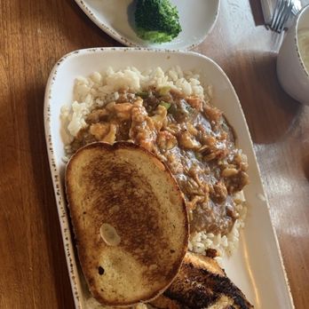 Orleans Seafood Kitchen - OL Blackened Tilapia, with OL Med Craw Etou and broccoli - Cajun/Creole Near Me - Katy, Texas