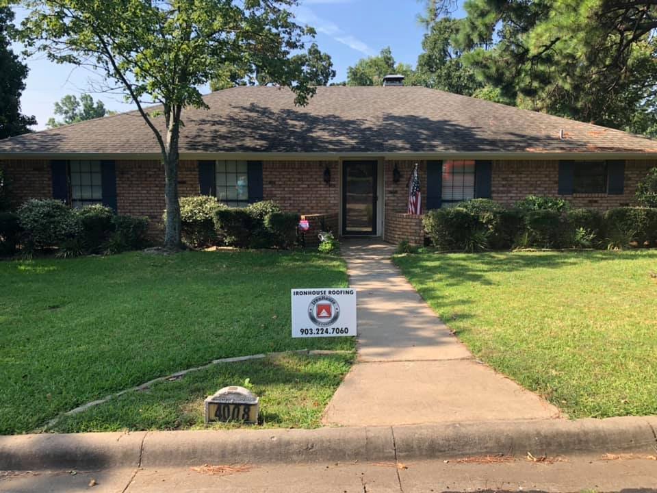 Slide of IronHouse Roofing