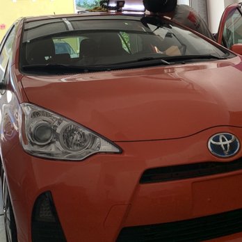 Lux Paintless Dent Removal - Demyan of Lux hard at work. - Body Shops Near Me