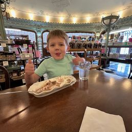 Little guy loving a banana split