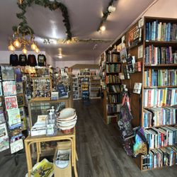 Esoteric books, tarot decks, crystals, candles, and spiritual tools.