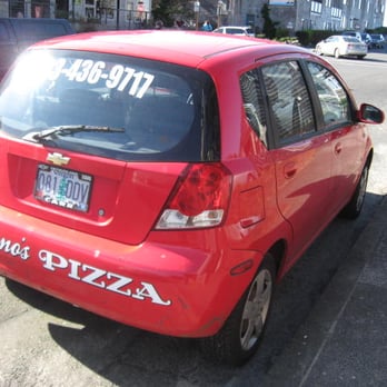 Cannon Beach - Fultano's Pizza in Cannon Beach has a bright red delivery car you can't help but notice. - Beaches Near Me