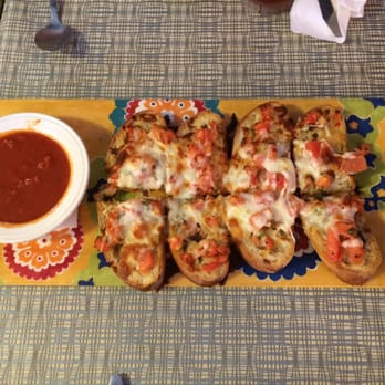 Gourmet Express - a plate of pizza and a bowl of tomato sauce - American Near Me - Grafton, West Virginia