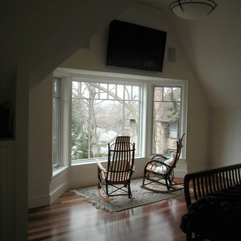Master Bedroom Addition With Flat Screen Tv Installed Over Bay