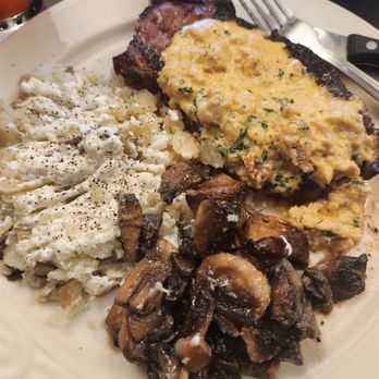 White Horse Tavern - Sirloin w/ a lump crab cream sauce, garlic mushrooms, and a baked potato - Sports Bars Near Me - Harpers Ferry, West Virginia White Horse Tavern - Sirloin w/ a lump crab cream sauce, garlic mushrooms, and a baked potato - Sports Bars Near Me - Harpers Ferry, West Virginia