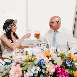 Flowers at the sweetheart table and flower crown