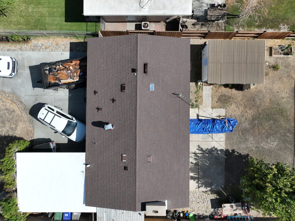 Slide of First Division Roofing