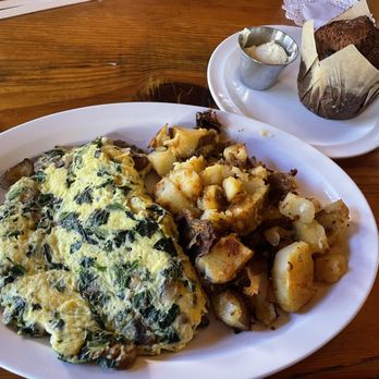 Janet's Montana Cafe - Spinach Omelette, Home Fries, and Honey Bran Muffin. - American Near Me - Alpine, California Janet's Montana Cafe - Spinach Omelette, Home Fries, and Honey Bran Muffin. - American Near Me - Alpine, California