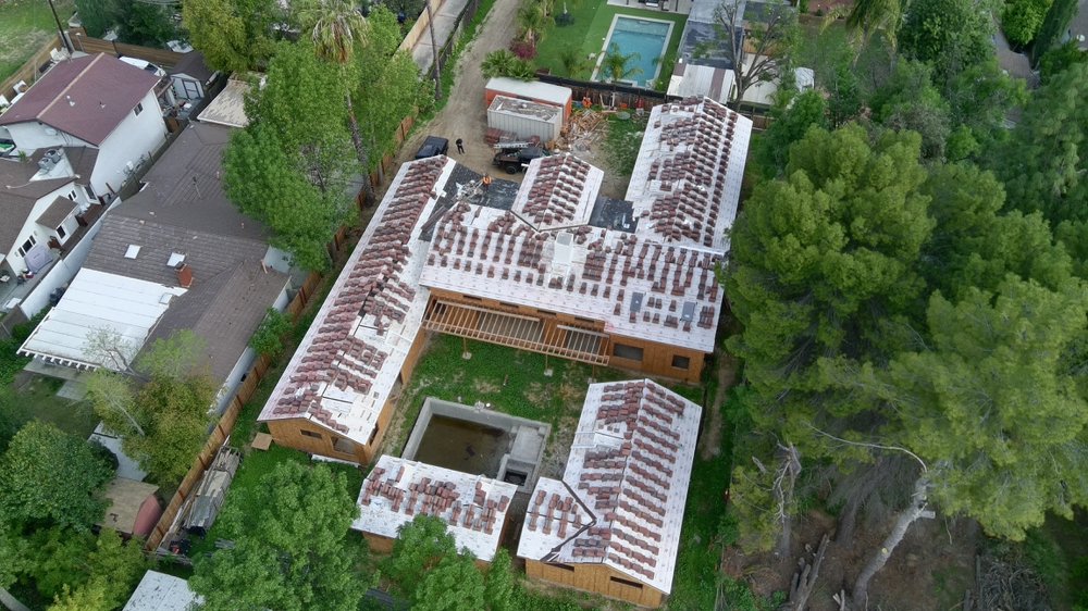 Slide of Confirmed Roofing Experts