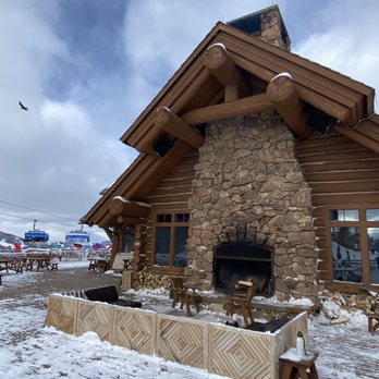 Everett's 8800 - Entrance with fireplace. - New American Near Me - Big Sky, Montana