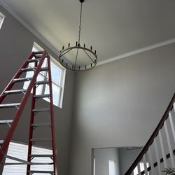 Esposito's Electric - Remove and install a chandelier at 20' high ceiling.