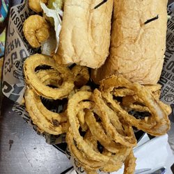 Walk-On's Sports Bistreaux - Towne Center Restaurant - Shrimp Poboy with Onion Rings ( an extra charge)
