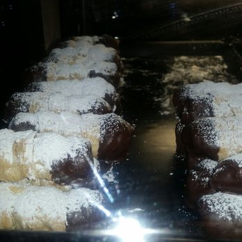 Argentina Bakery - Flaky crust outside filled with caramel. Taste like a cannoli dusted  with confectioners sugar. Tasty! - Bakeries Near Me - Irving, Texas