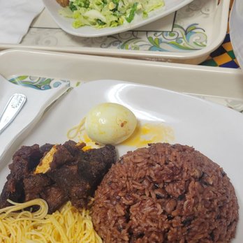 Elna's African Delights - two plates of food - African Near Me - Columbus, Ohio Elna's African Delights - two plates of food - African Near Me - Columbus, Ohio