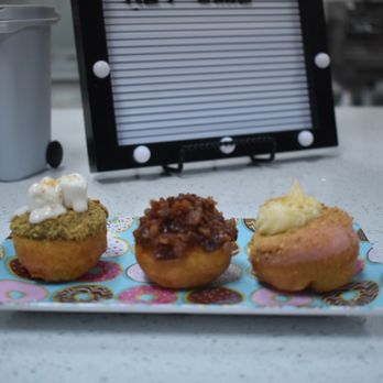 Van Dough - Left to right: s'mores, sweet piggy, New York cheesecake - Donuts Near Me - Clearwater, Florida Van Dough - Left to right: s'mores, sweet piggy, New York cheesecake - Donuts Near Me - Clearwater, Florida