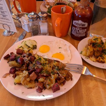 Tangerine Restaurant - Corned beef hash and eggs with a side of potatoes. - Breakfast & Brunch Near Me - Boulder, Colorado Tangerine Restaurant - Corned beef hash and eggs with a side of potatoes. - Breakfast & Brunch Near Me - Boulder, Colorado