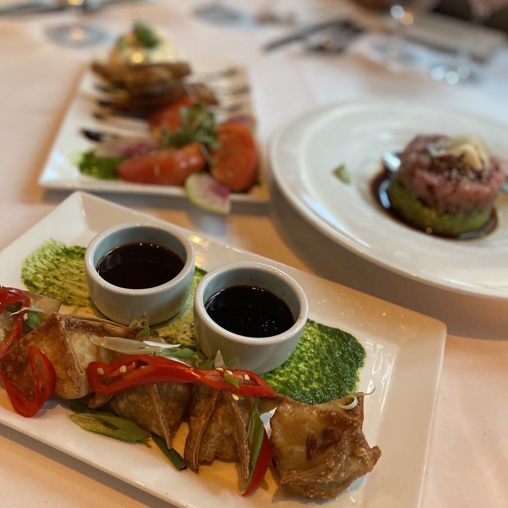 Roots Ocean Prime - two plates of food on a table - Steakhouses Near Me - Princeton, New Jersey Roots Ocean Prime - two plates of food on a table - Steakhouses Near Me - Princeton, New Jersey