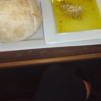 The Getaway - Warm bread  with oil and parmesan cheese to dunk it in - Italian Near Me - Lake Geneva, Wisconsin