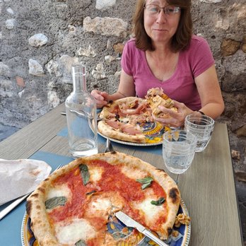 La Fornarina - Pizzas Regina Margherita with Bufalo Mozzarella and Pizza Nobile with Gorgonzola Dulce, Speck and Walnuts. - Pizza Near Me - Tivoli, RM La Fornarina - Pizzas Regina Margherita with Bufalo Mozzarella and Pizza Nobile with Gorgonzola Dulce, Speck and Walnuts. - Pizza Near Me - Tivoli, RM