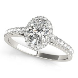 M D Cooper - Oval diamond engagement ring.