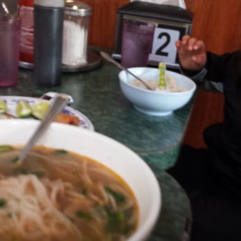 Pho Thai Hung - Jr laughing while eating his chicken soup. - Vietnamese Near Me - Richmond, California Pho Thai Hung - Jr laughing while eating his chicken soup. - Vietnamese Near Me - Richmond, California