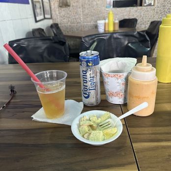 Tacón de Marlin - Corona Light, a salad with cucumber, maybe radish, tasty. Waiting on my "to go." - Mexican Near Me - Puerto Vallarta, JAL Tacón de Marlin - Corona Light, a salad with cucumber, maybe radish, tasty. Waiting on my "to go." - Mexican Near Me - Puerto Vallarta, JAL