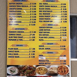 Cuisine of India - 05.2023 Menu on wall