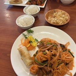 Wang's Chinese Restaurant - (1) General T'so chicken with white rice & shrimp spring roll (2) Hot & Spicy Thai Red Curry Combo with white rice & shrimp spring roll