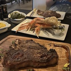 Porterhouse Alaskan King Crab Legs, Creamed Corn, Broccolini and Ribeye.