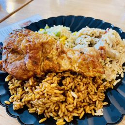 Peri Peri Chicken with Jollof, Seafood and Coconut Rice Peri Peri Chicken with Jollof, Seafood and Coconut Rice