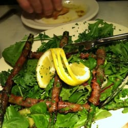 Centro Café - Asparagus wrapped with Proscuitto on salad greens.
