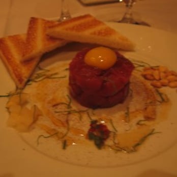 Michael Mina - Ahi tuna tartare. Pre-mixed by server. - New American Near Me - Las Vegas, Nevada Michael Mina - Ahi tuna tartare. Pre-mixed by server. - New American Near Me - Las Vegas, Nevada