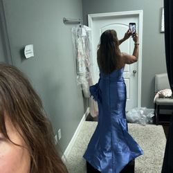 Nikki's Glitz and Glam Boutique - September try on to small EVEN the manager new it was to small after they altered it.