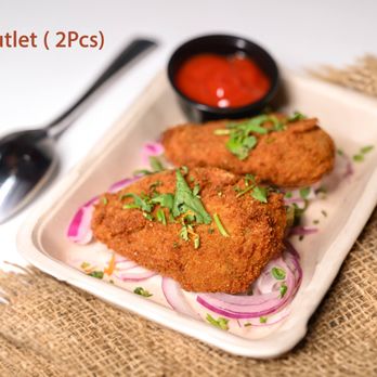 Amrutha Vilas - a plate of fried food - Indian Near Me - San Ramon, California