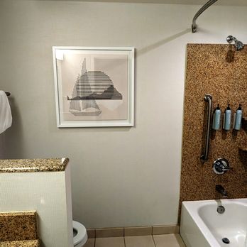 Courtyard by Marriott Seattle Kirkland - Bathroom. They should have switched the towel rack and picture so the towels would be easy to reach from the bathtub. - Hotels Near Me - Kirkland, Washington Courtyard by Marriott Seattle Kirkland - Bathroom. They should have switched the towel rack and picture so the towels would be easy to reach from the bathtub. - Hotels Near Me - Kirkland, Washington