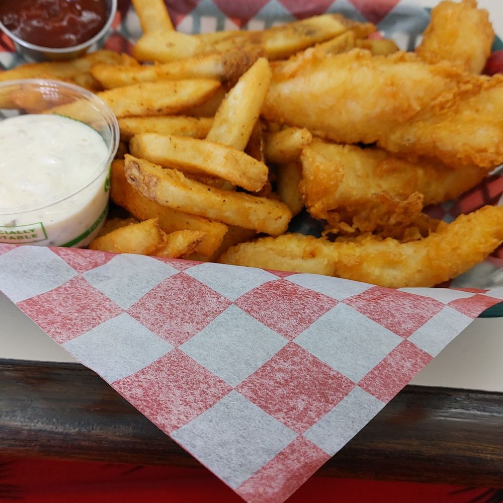 a basket of fries and ketchup a basket of fries and ketchup