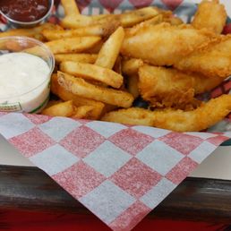 a basket of fries and ketchup