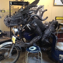 One World Bazaar - Predator on Motorcycle made from scrap metal from bicycles and motor bikes